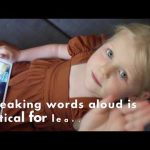 Child talks with AI powered cartoon robot and learns to count