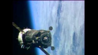 Soyuz hooks up to the station