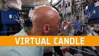 Luca Parmitano blows out his virtual candle on the Astro Pi