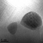 Watch Atoms of Gold on FeO Move Under an Electron Microscope
