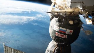 Space Station Crew Relocate Soyuz Spacecraft
