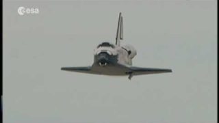 Space Shuttle Discovery returns to Earth