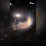 Zoom into interacting galaxies Arp 142 🔎 #shorts